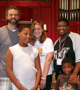 MTSO  student Mark Reed (left) at the Summit on 16th Freedom School with  scholar Nar'dez Lawson, volunteer Allison Stickley-Miner, site coordinator Grecca Walker and scholar Gabriel Cole