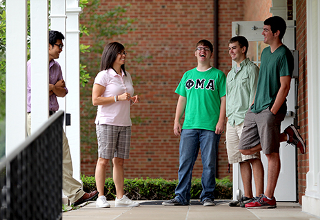 Recruiter David Allen and West Ohio Program and Resource Assistant Tiffanie Shanks share a laugh with interns Andy Burns, Alex Wiles and Rocky Riddle on the MTSO campus